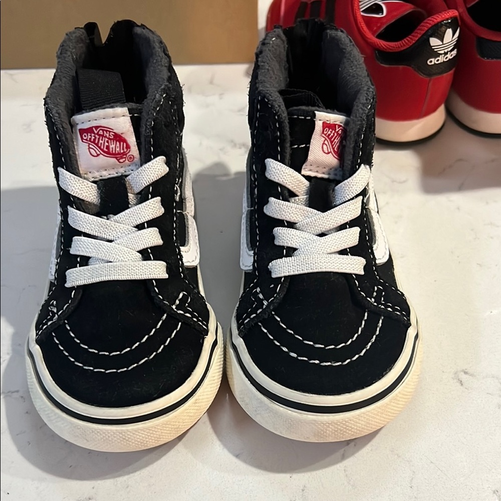 Vans Black and White High-Top Sneakers